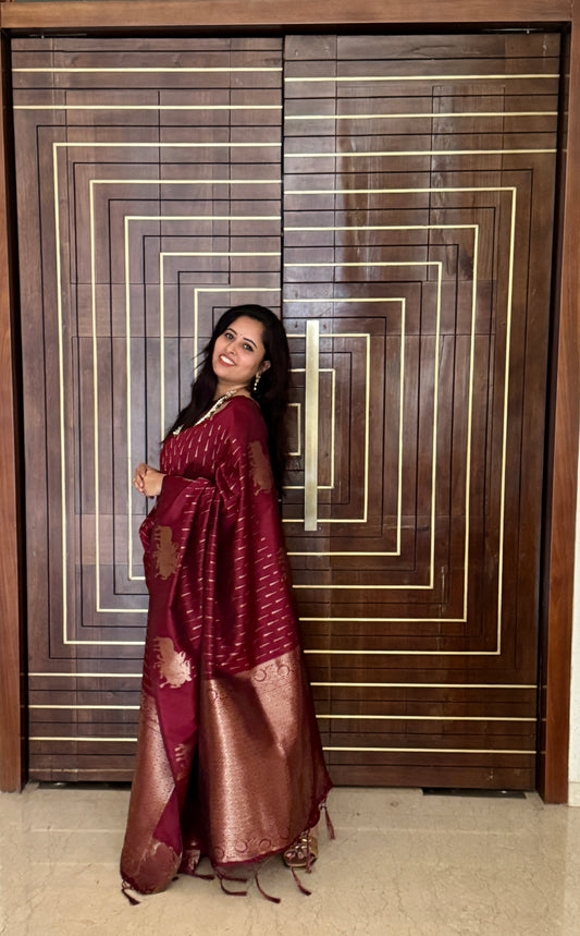 Wine-maroon Pichwai motifs Litchi Silk saree