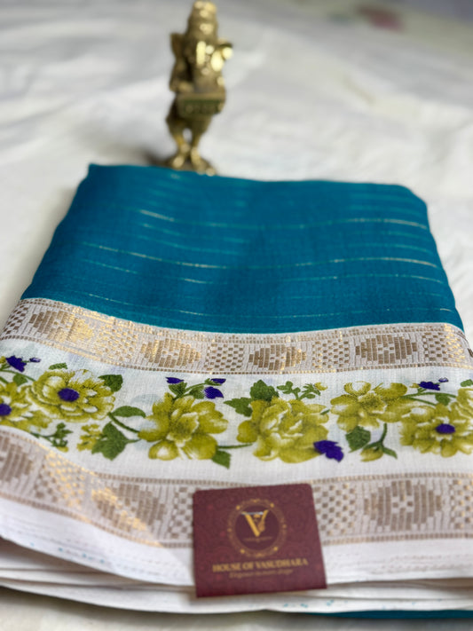 Turquise blue Georgette with Floral Bentex border