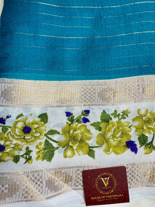 Turquise blue Georgette with Floral Bentex border