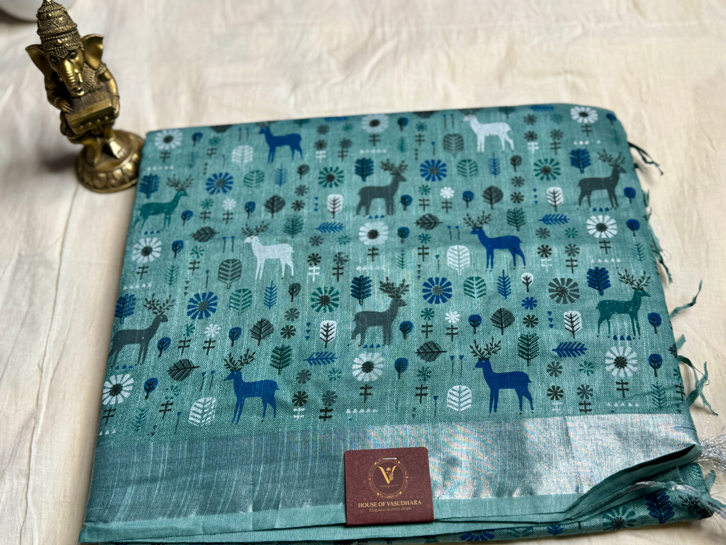 Teal blue animal print in Mul Cotton