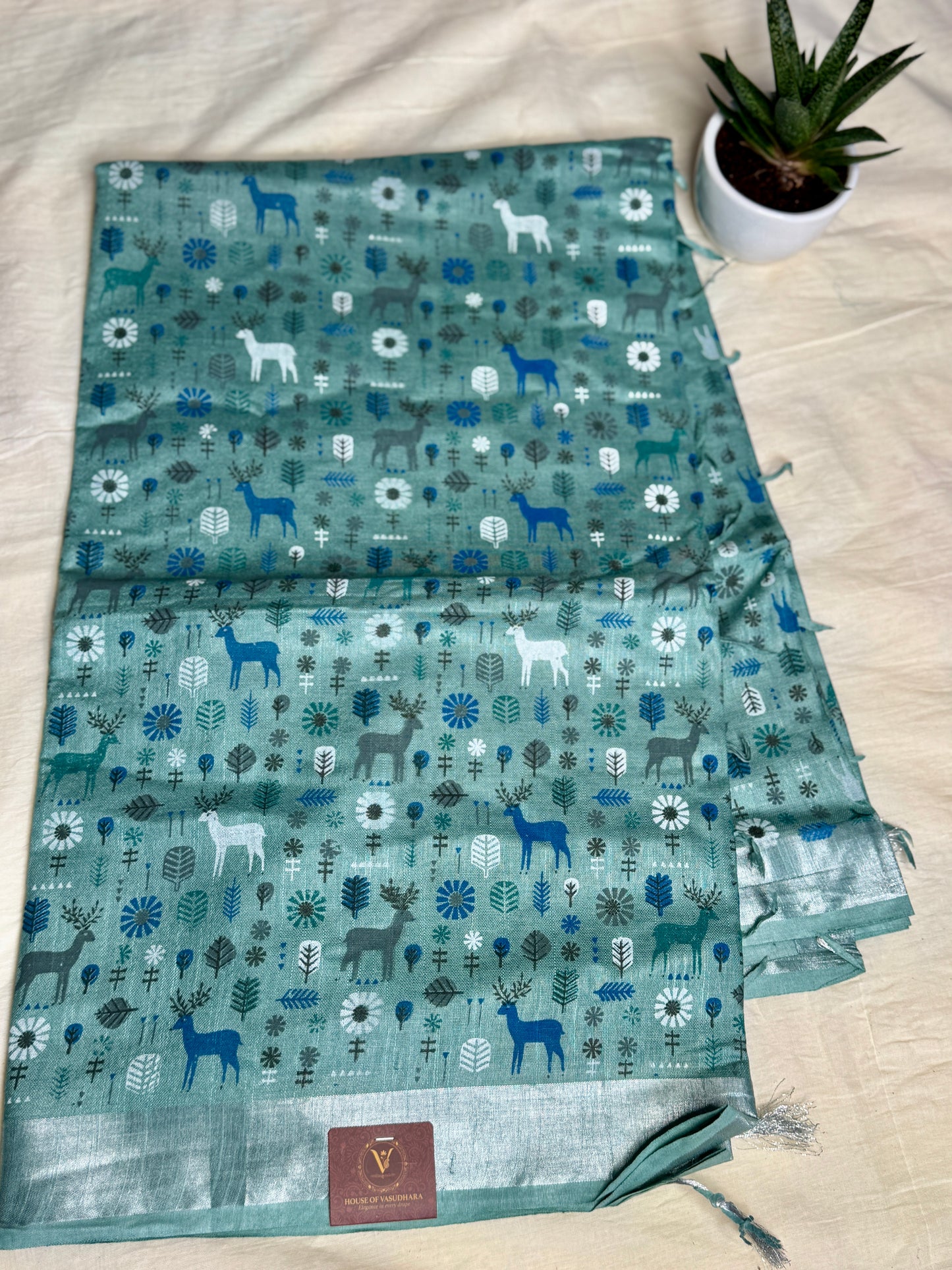 Teal blue animal print in Mul Cotton