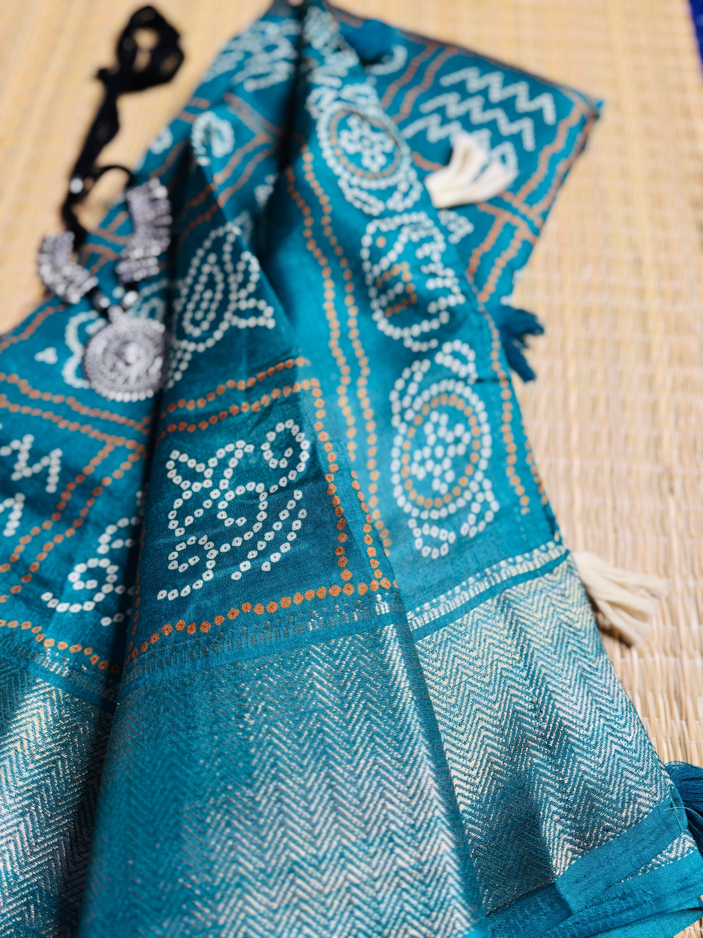 Sea green Dola Bandhani Silk Saree with Zari Border