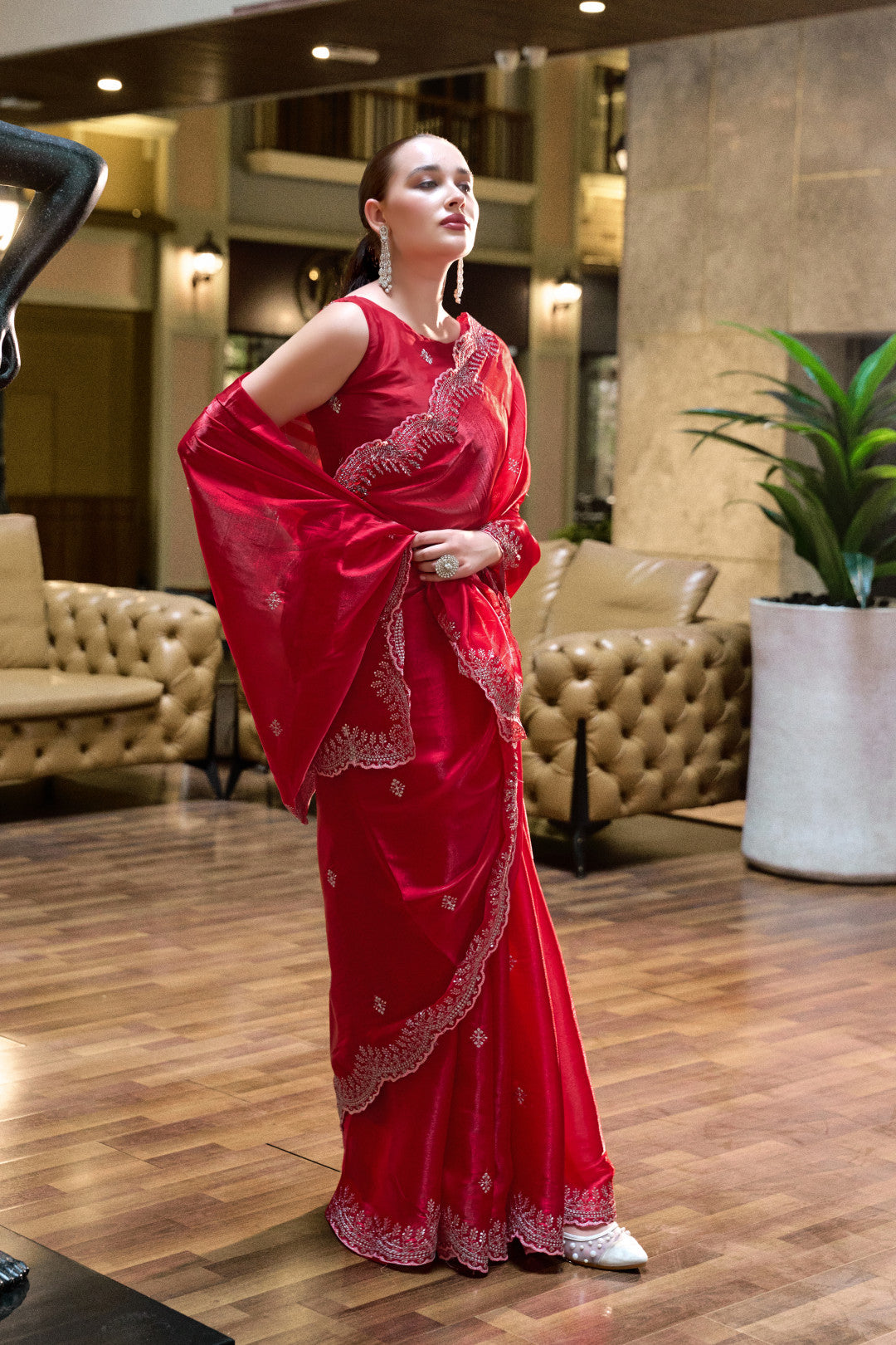 Red tissue silk saree with Scallop border