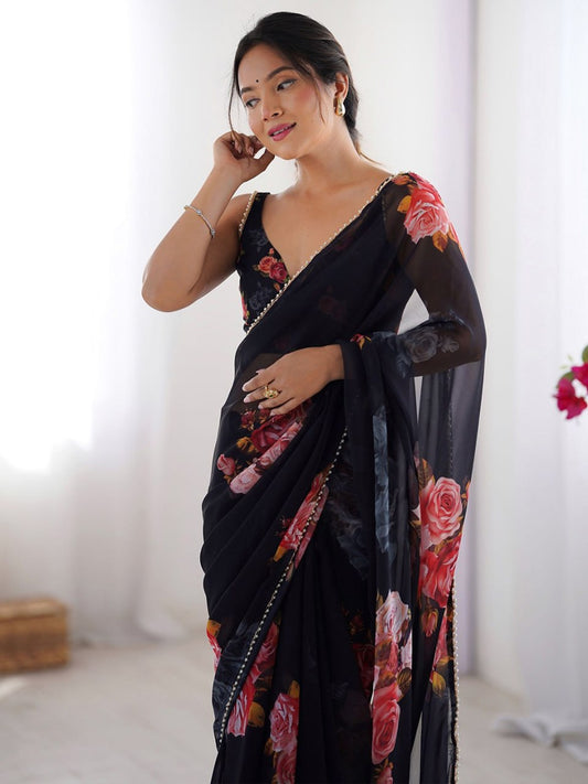Black georgette saree with floral print and pearl border