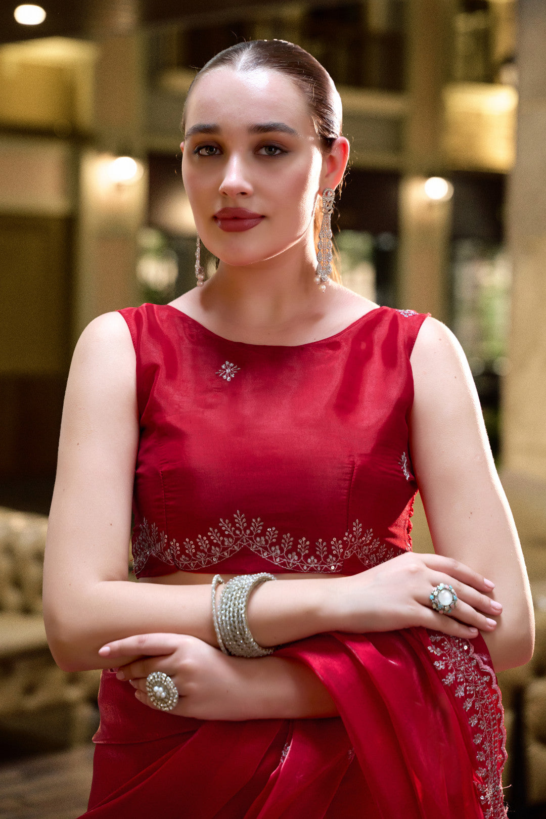 Red tissue silk saree with Scallop border