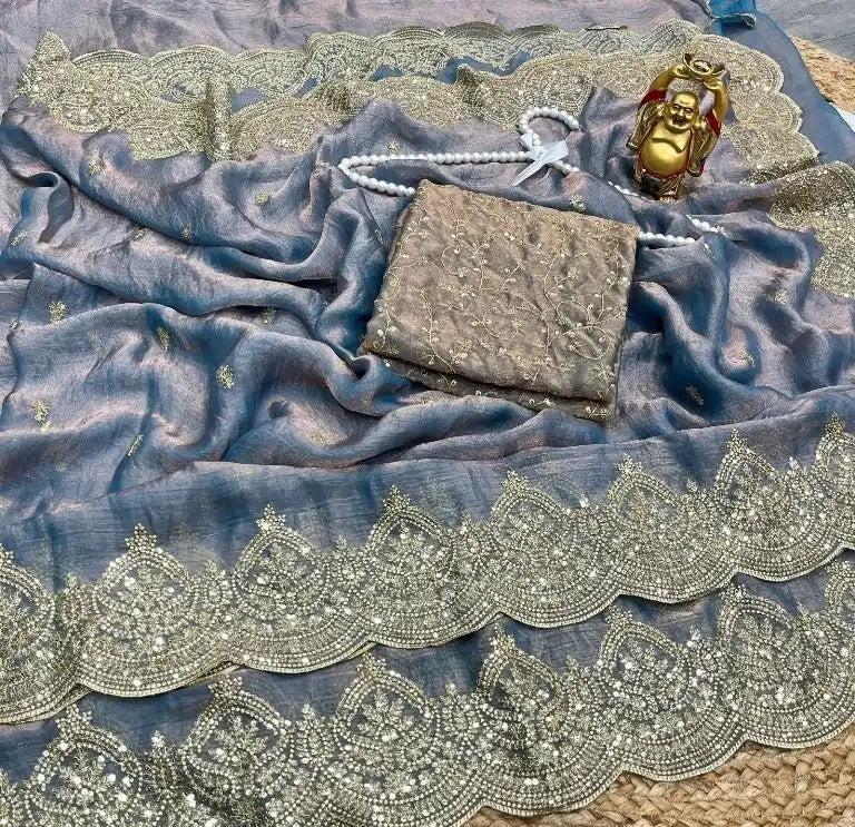 Blue chiffon saree with sequence work and Aarco Border