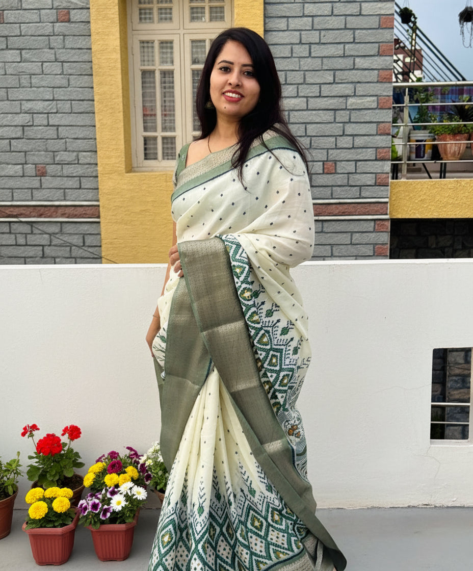 Ivory with Pista green Dola Ikkat Silk Saree