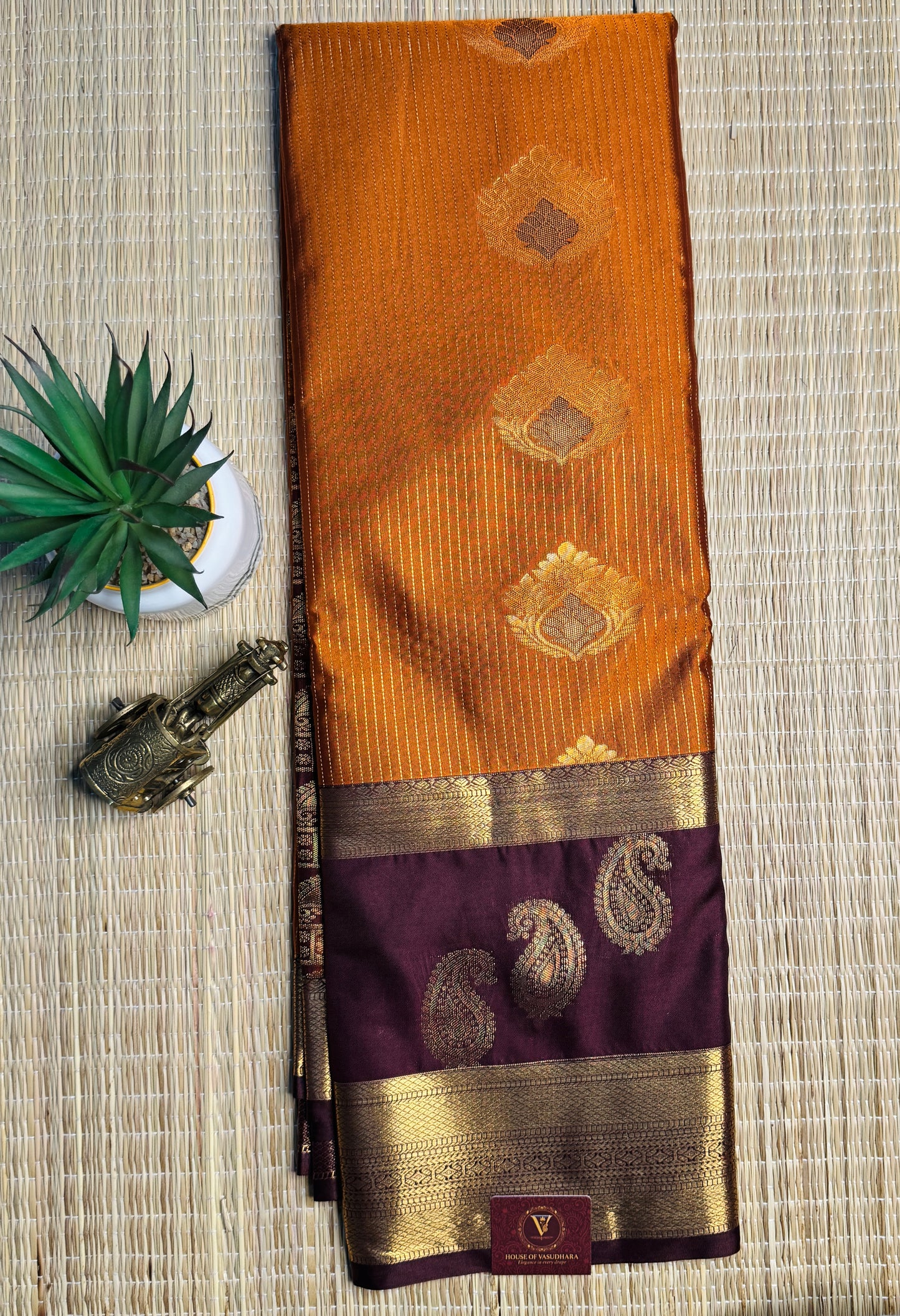 Rust orange and Brown semi Kanchi silk with stripes and Mango border