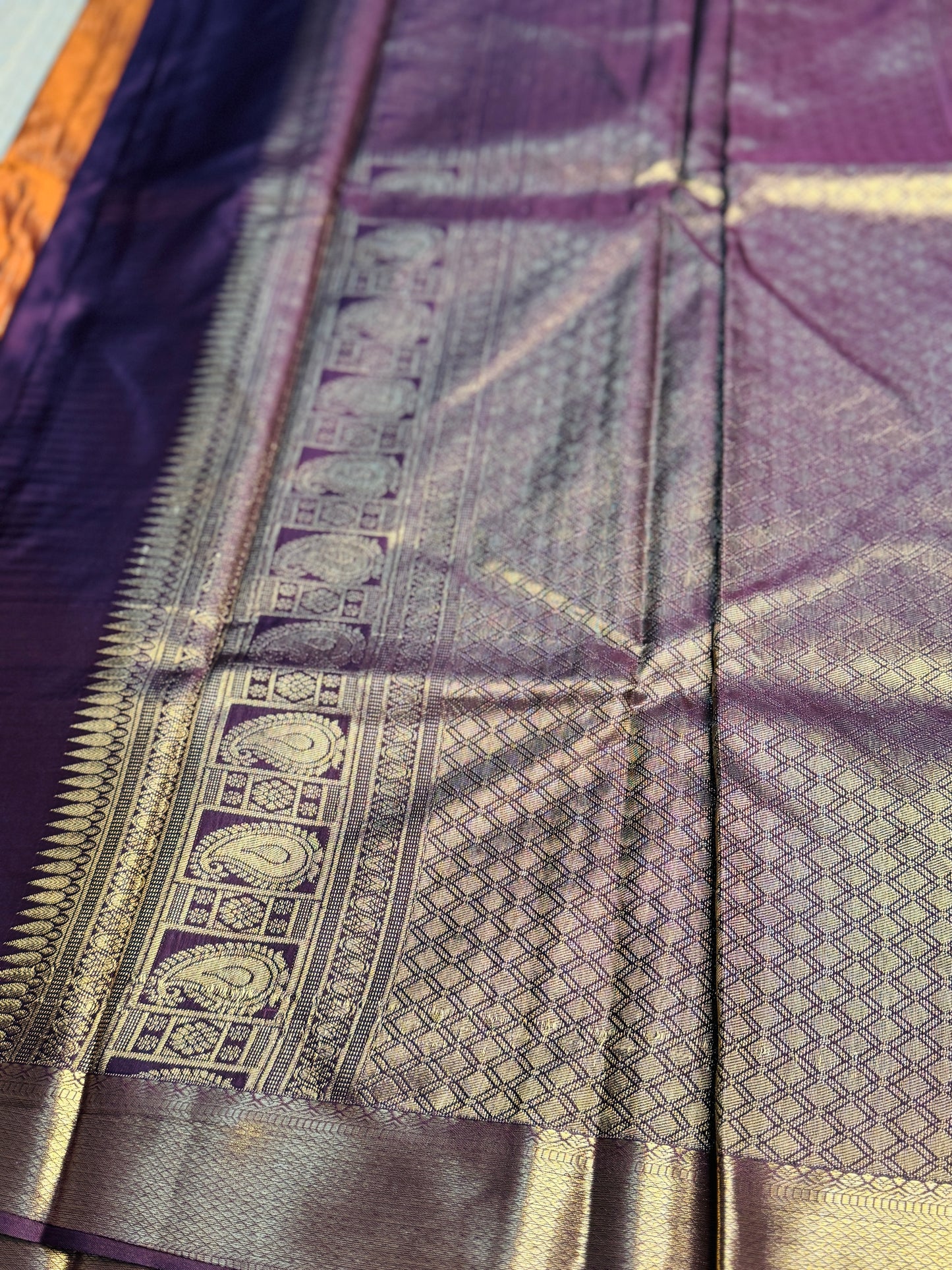 Rust orange and Brown semi Kanchi silk with stripes and Mango border