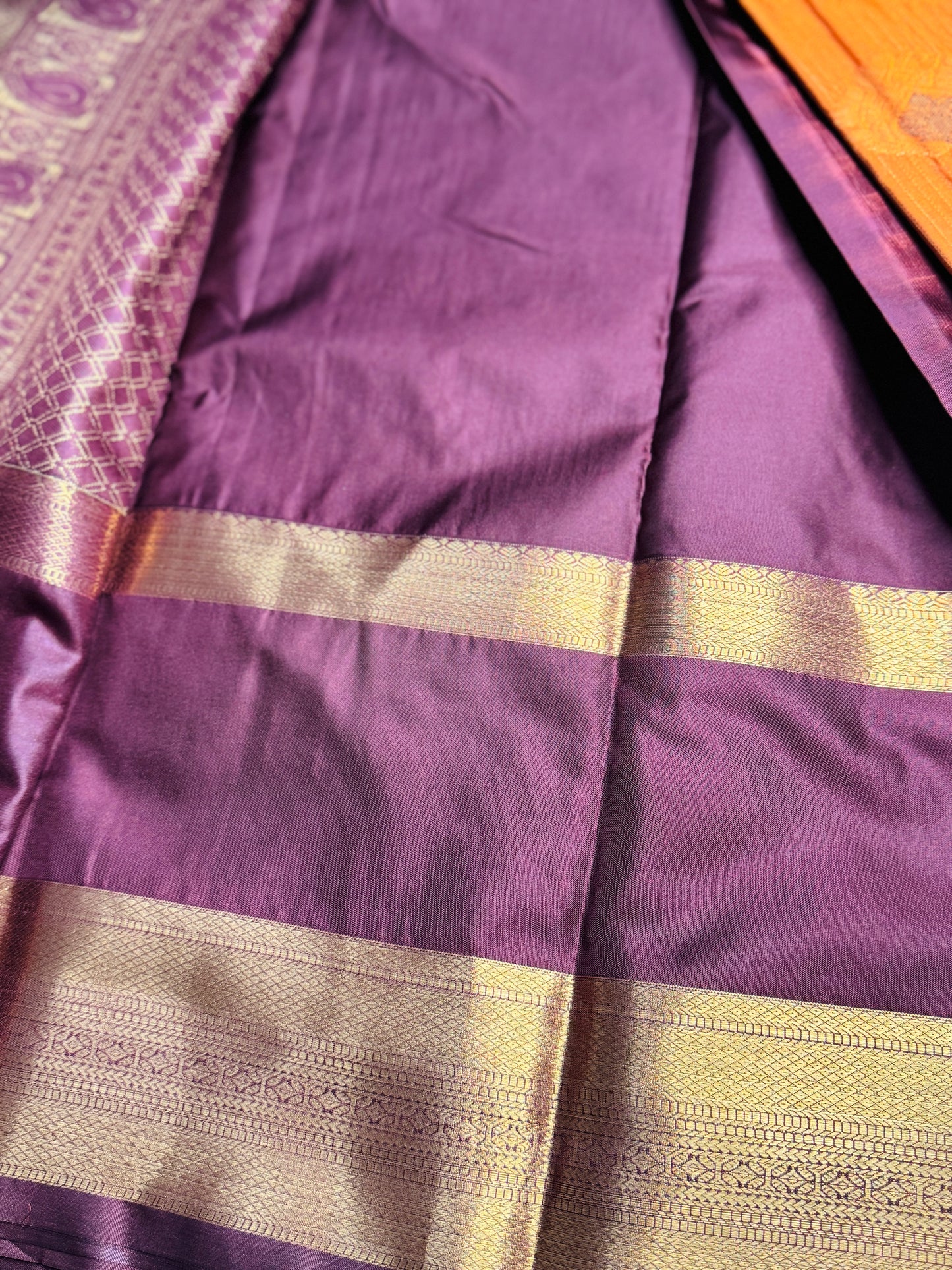 Rust orange and Brown semi Kanchi silk with stripes and Mango border