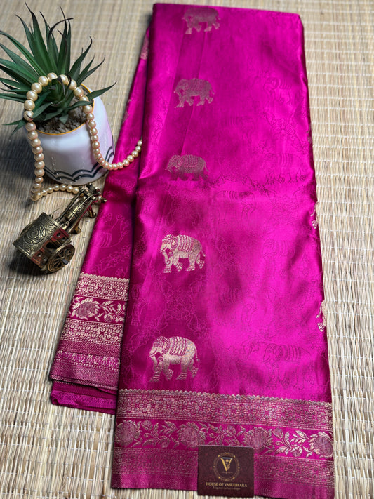Rani Pink Satin silk saree with elephant motifs