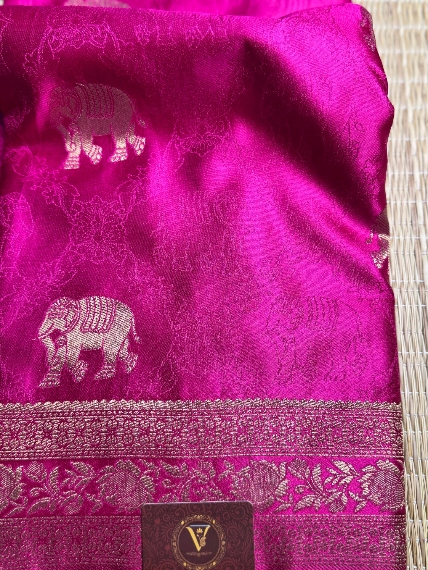Rani Pink Satin silk saree with elephant motifs