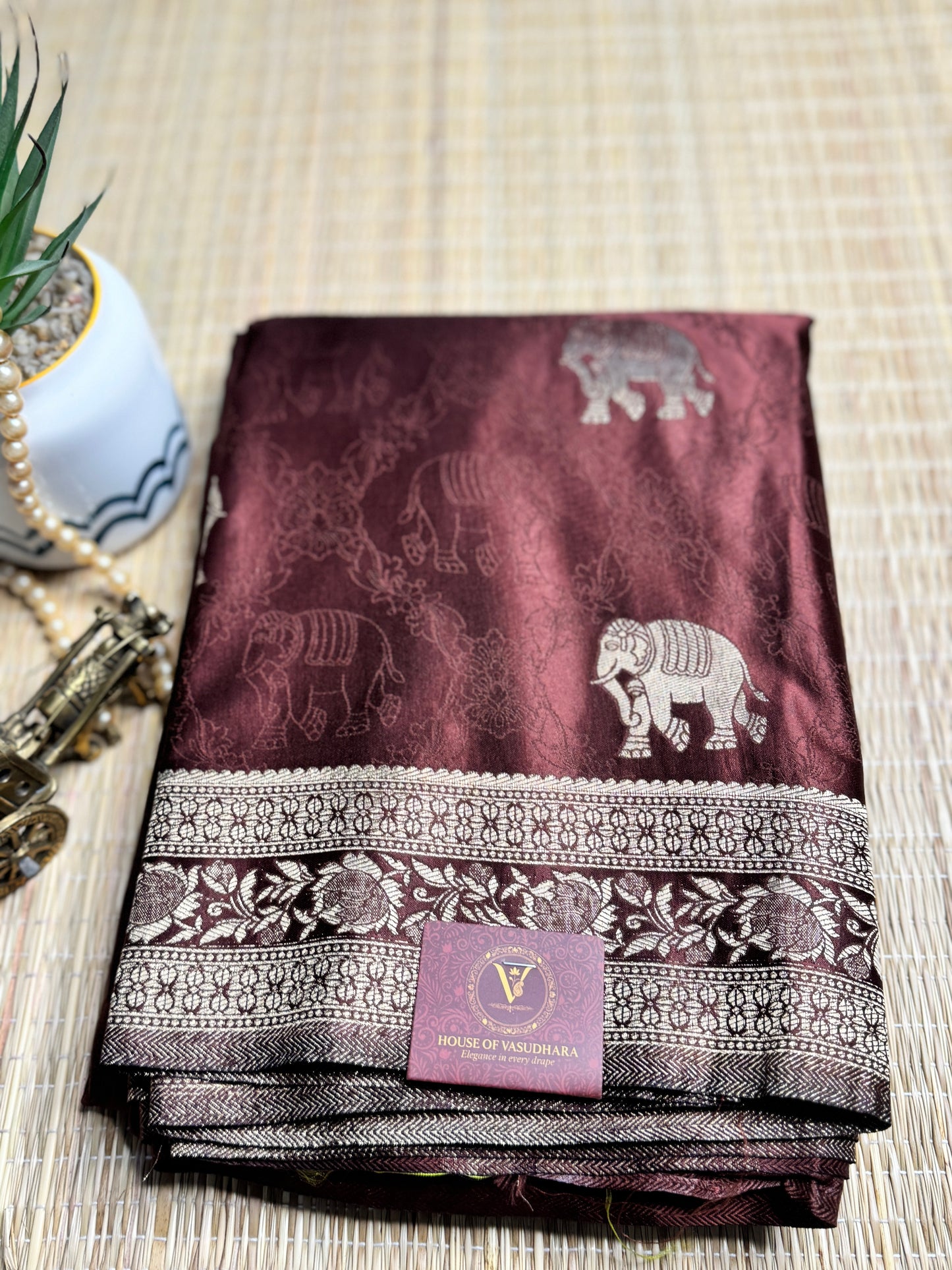 Brown Satin silk saree with elephant motifs