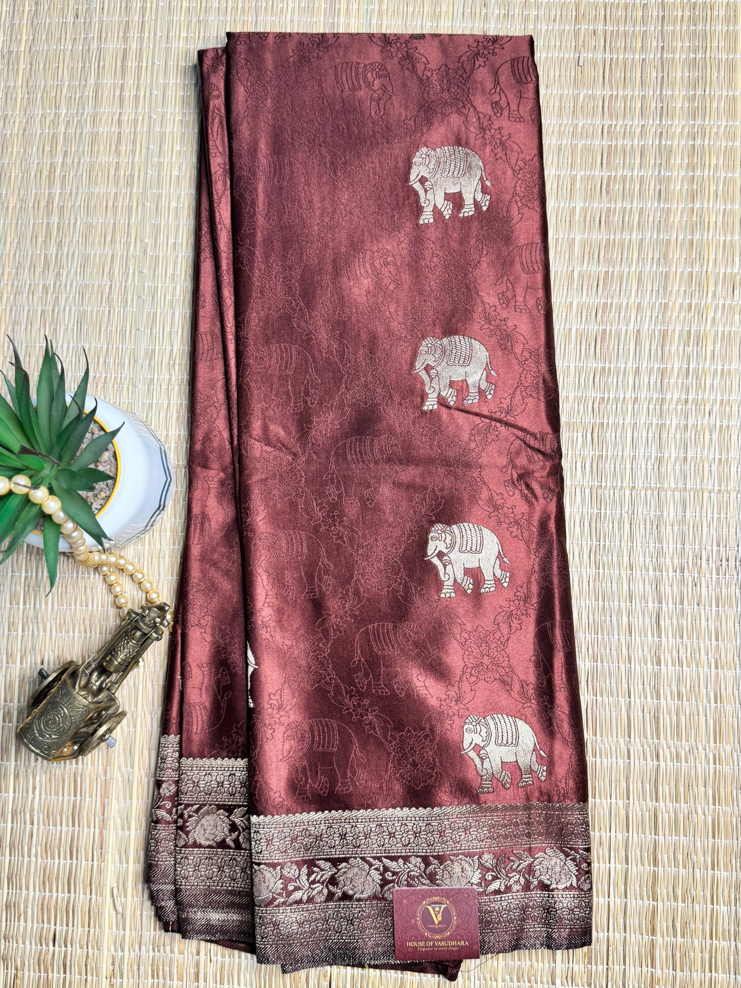 Brown Satin silk saree with elephant motifs