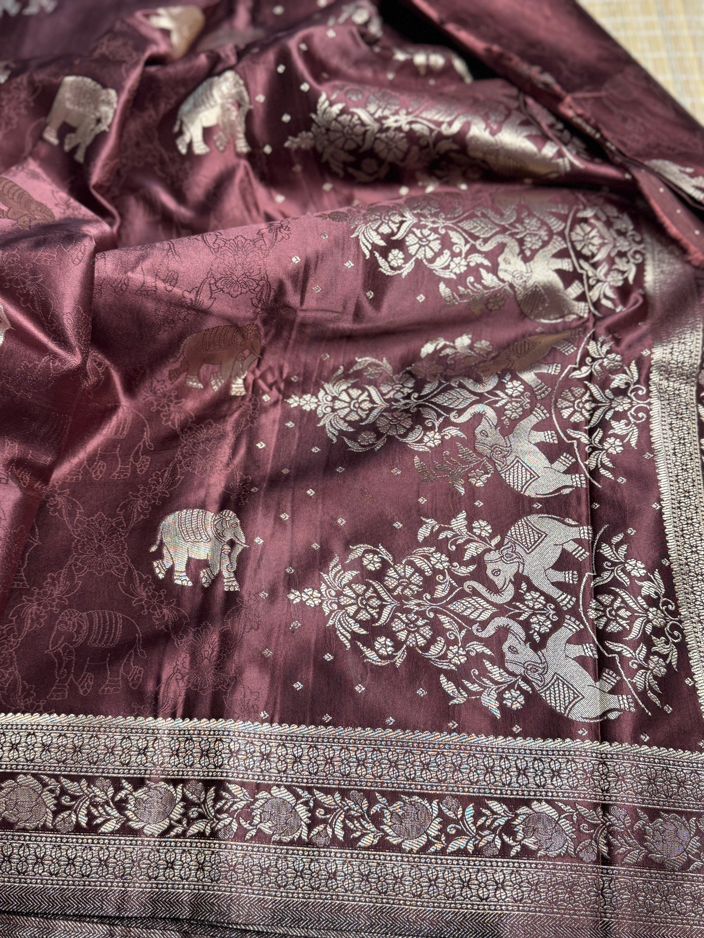 Brown Satin silk saree with elephant motifs