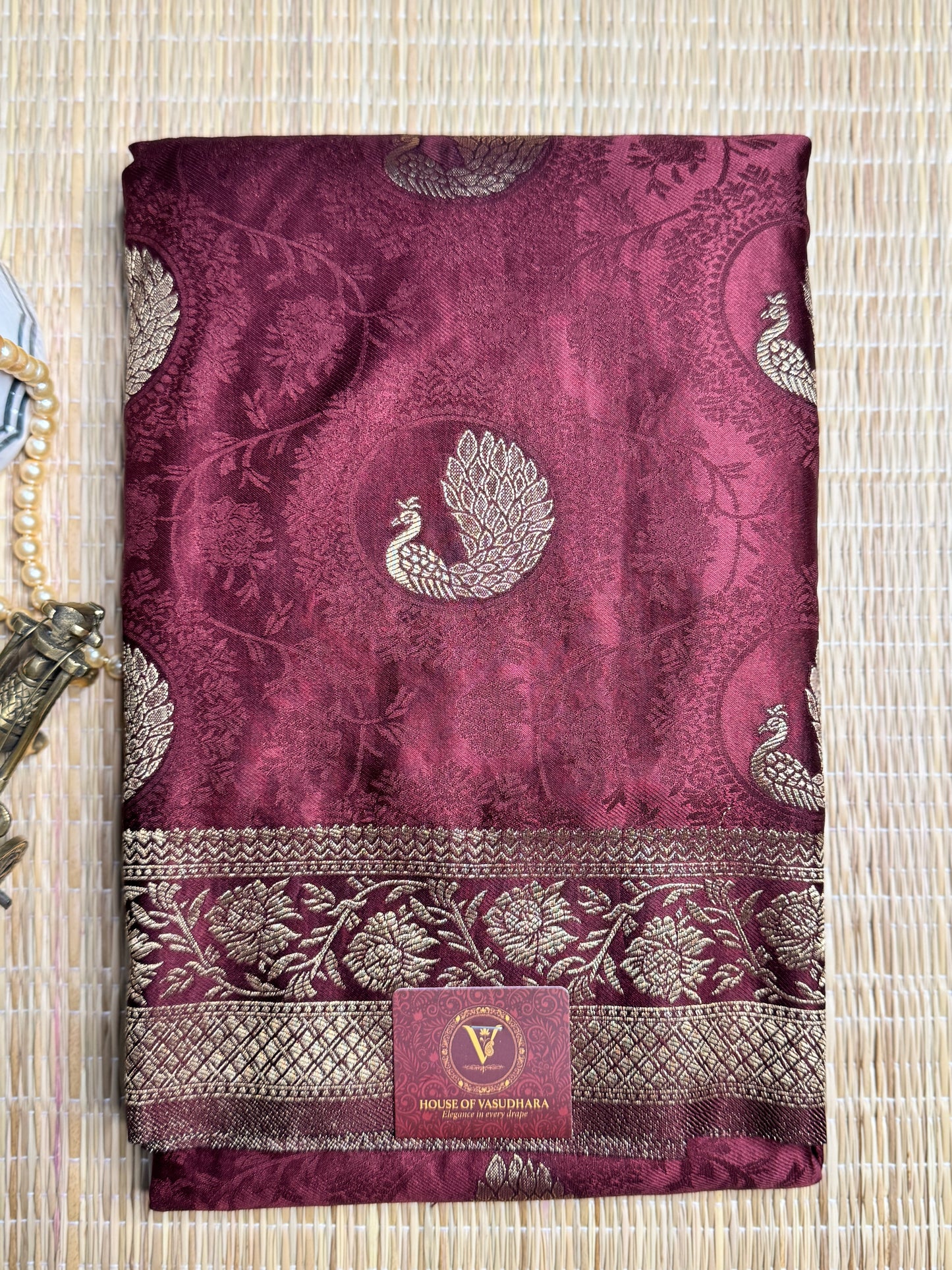 Brown Satin silk saree with Peacock motifs