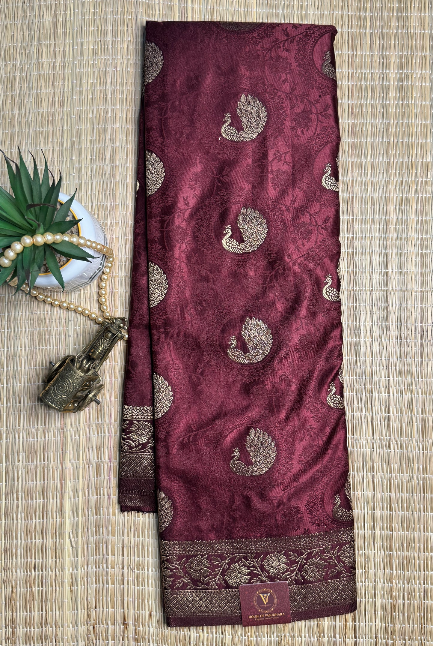 Brown Satin silk saree with Peacock motifs