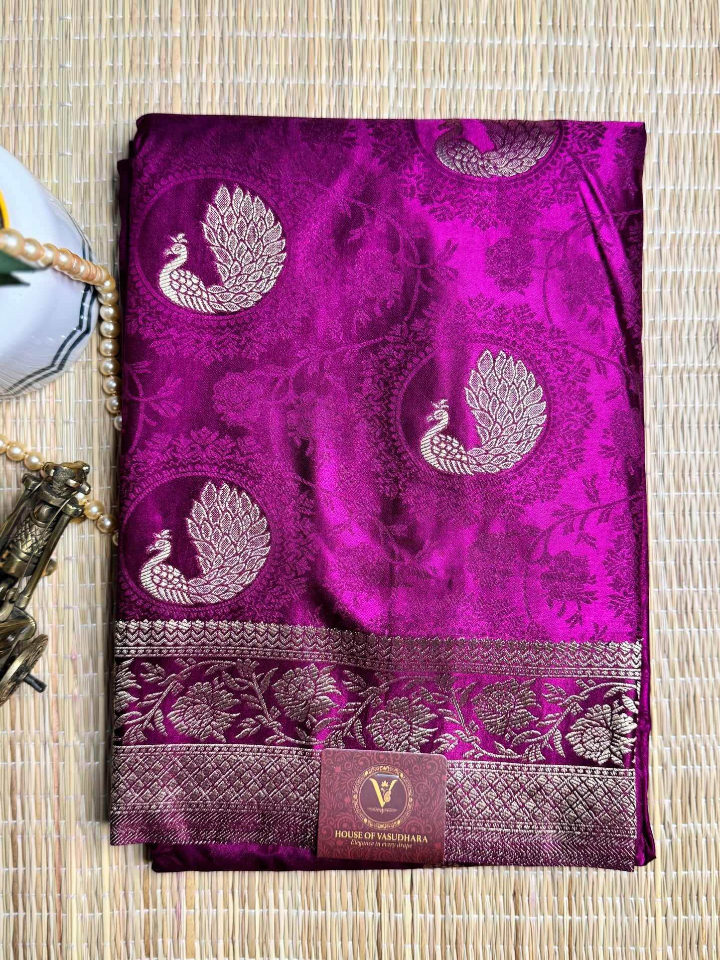Magenta Satin silk saree with Peacock motifs