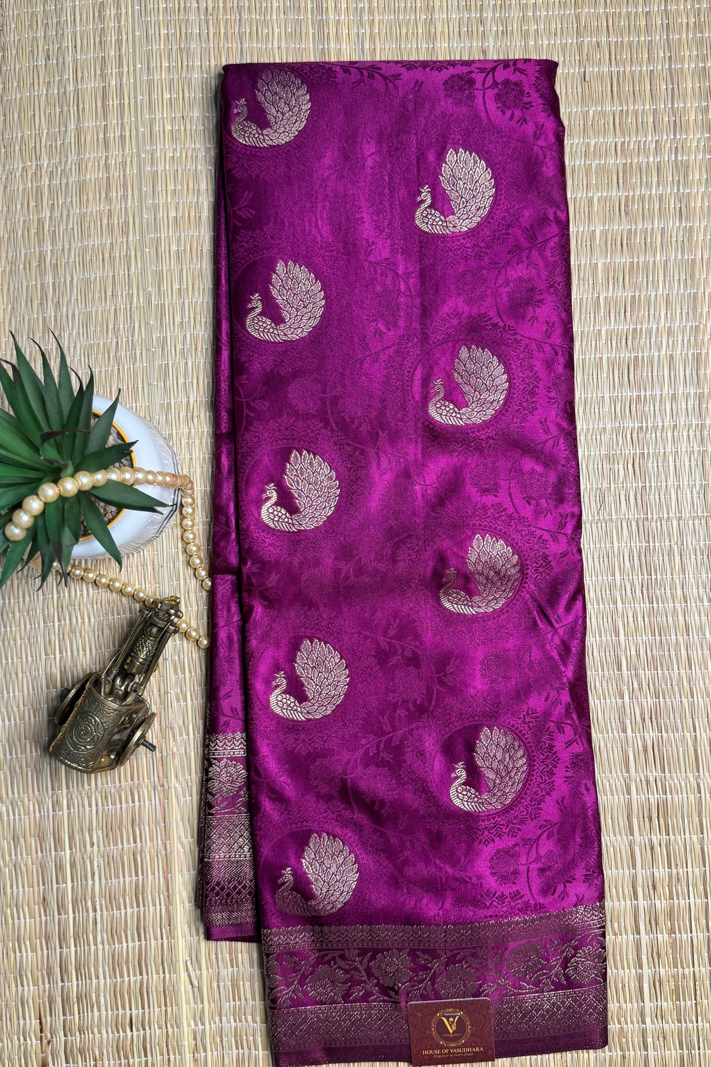 Magenta Satin silk saree with Peacock motifs