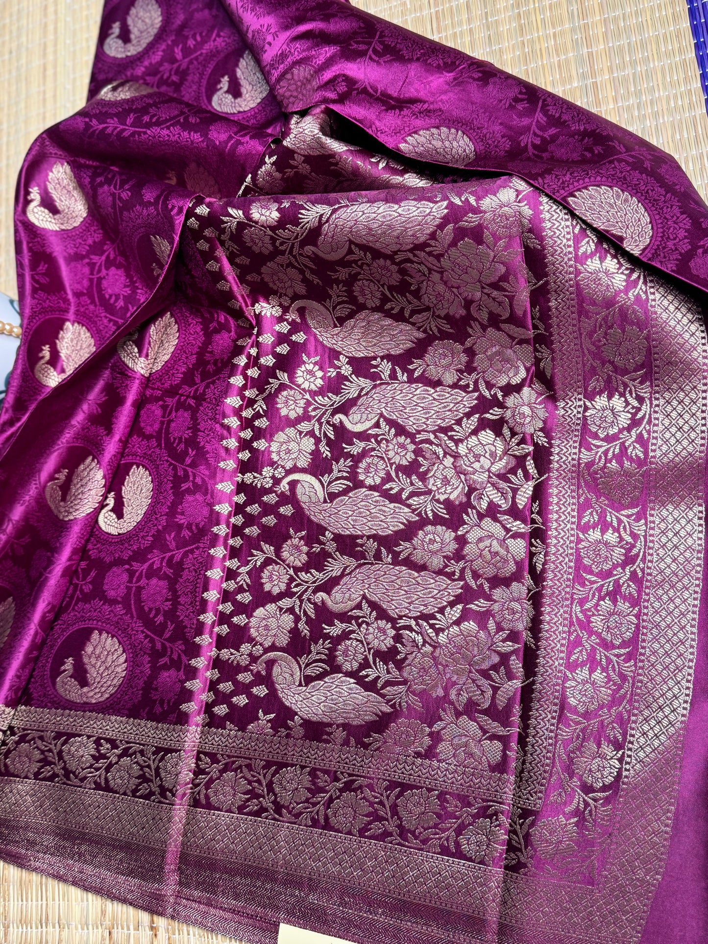 Magenta Satin silk saree with Peacock motifs