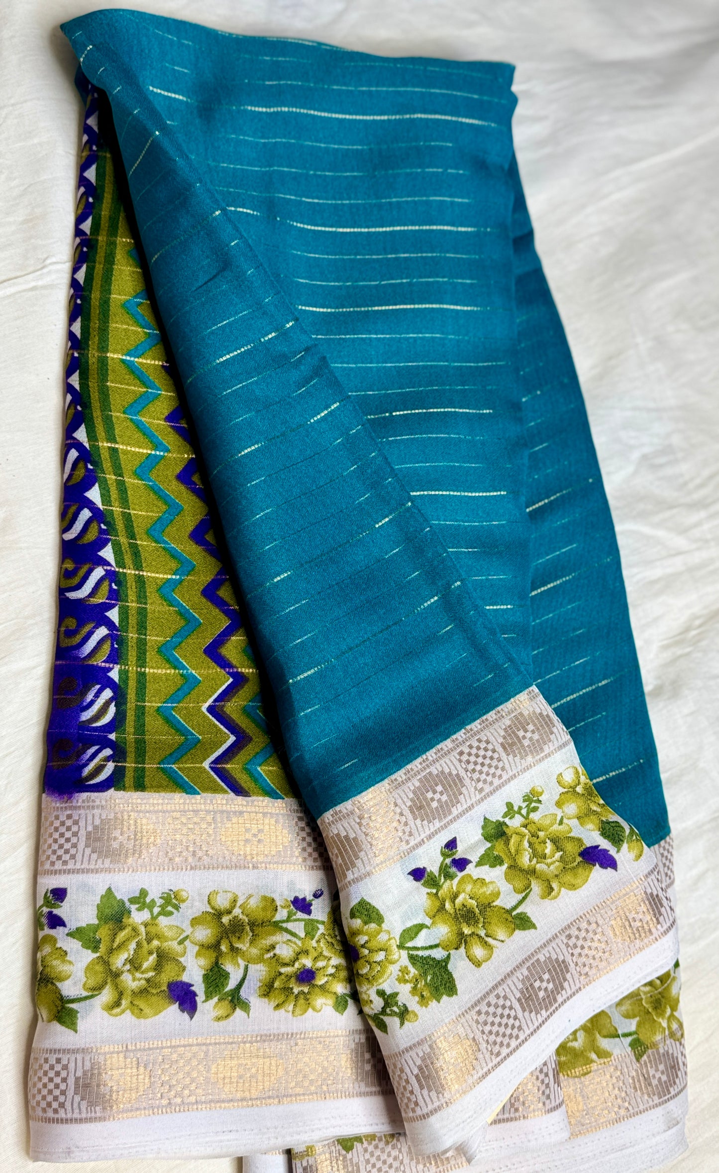 Turquise blue Georgette with Floral Bentex  border