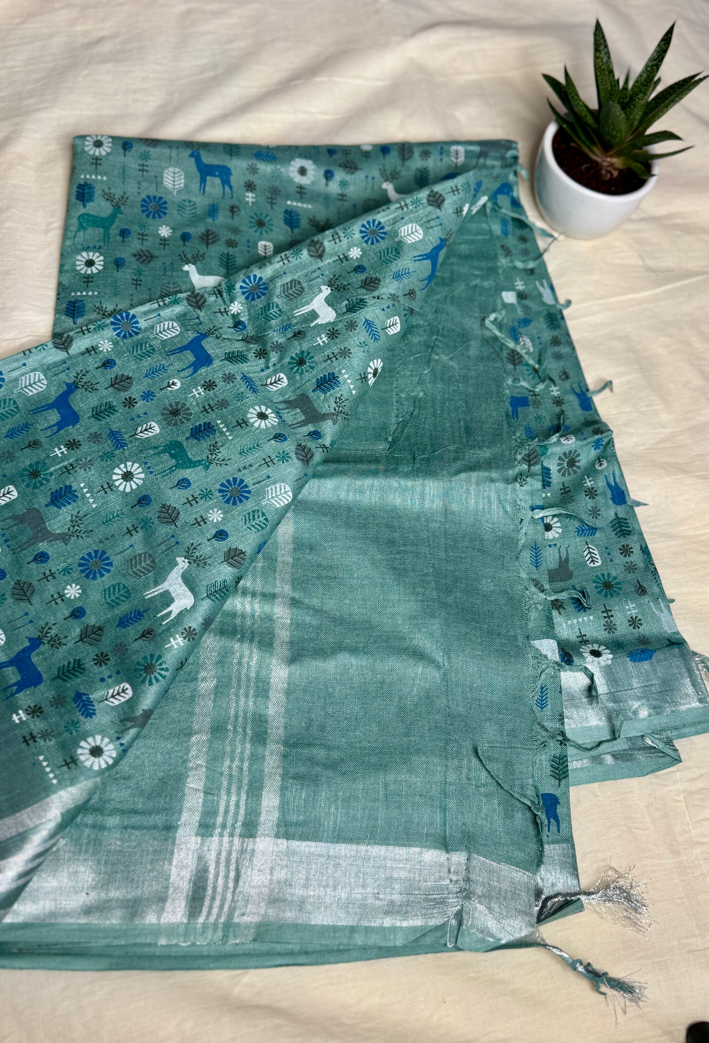 Teal blue animal print in Mul Cotton