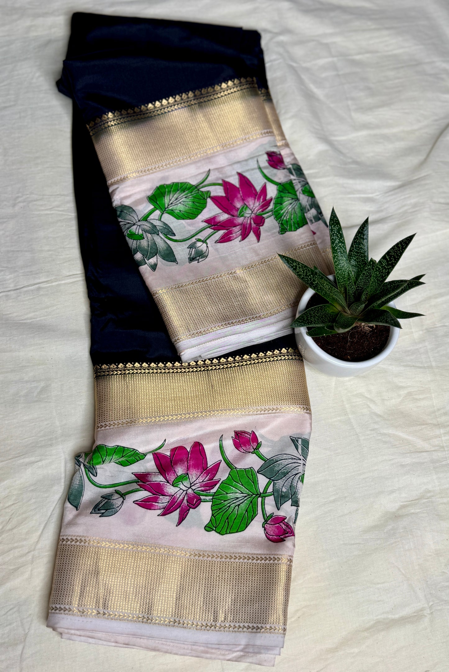 Black with Floral Bentex border Semi Crepe Saree