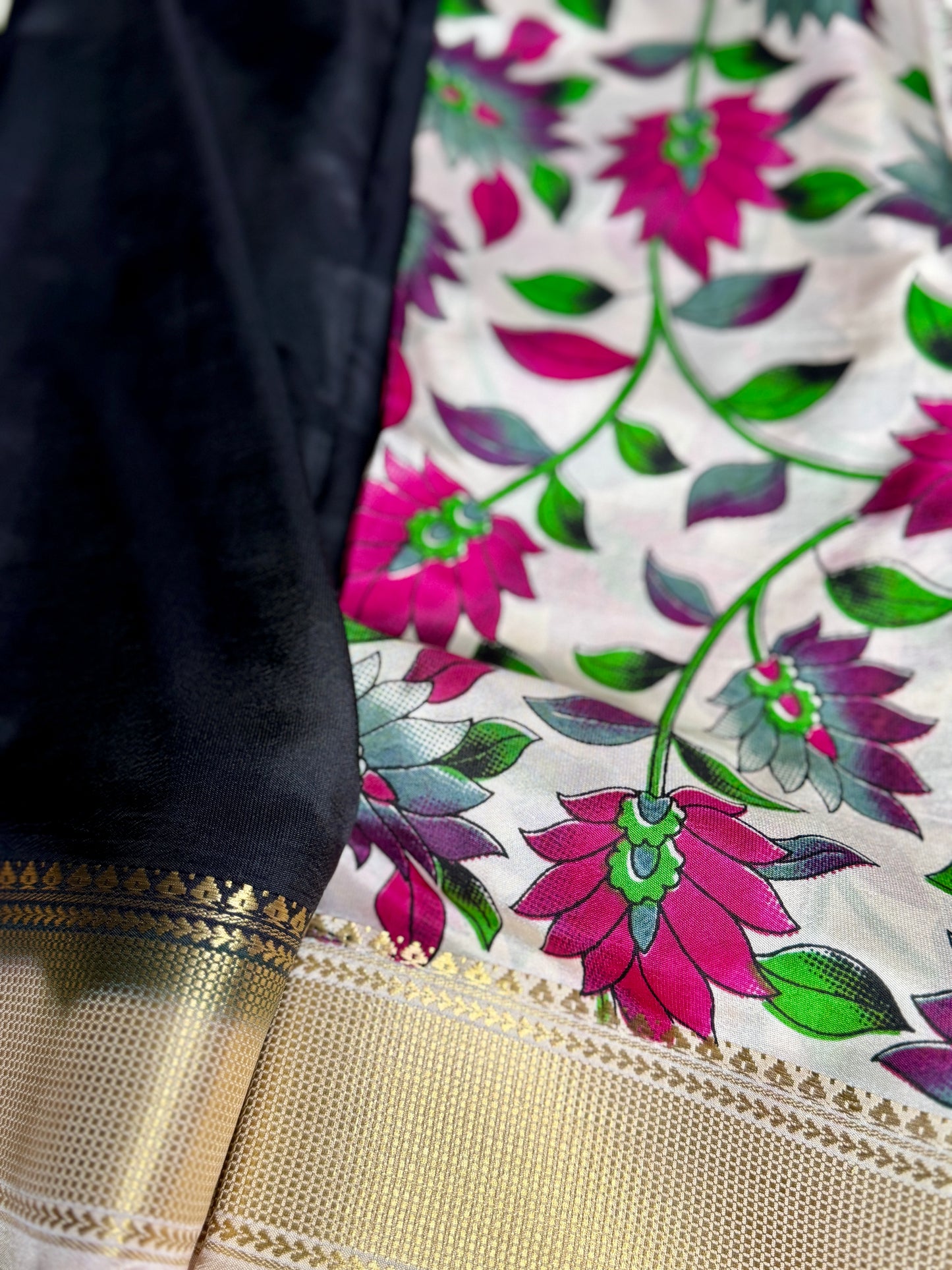 Black with Floral Bentex border Semi Crepe Saree