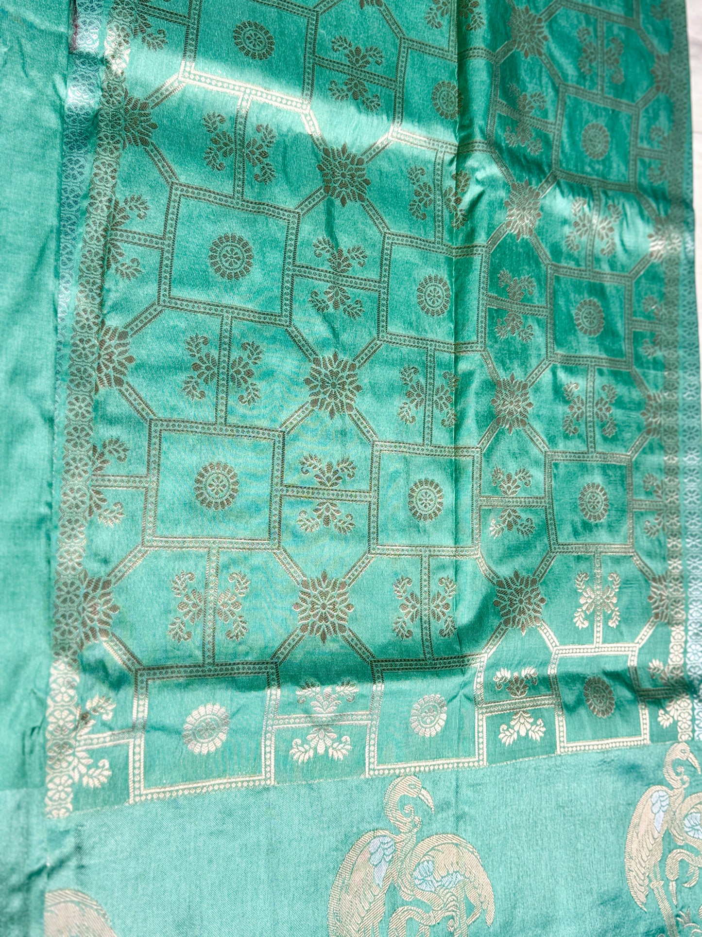 Teal green Satin silk saree with Flamingo Motifs