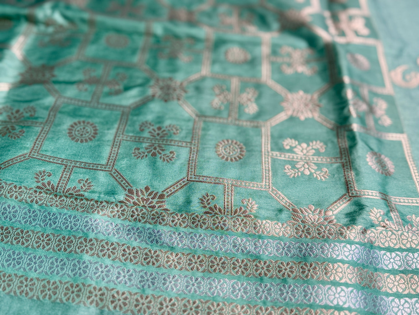 Teal green Satin silk saree with Flamingo Motifs