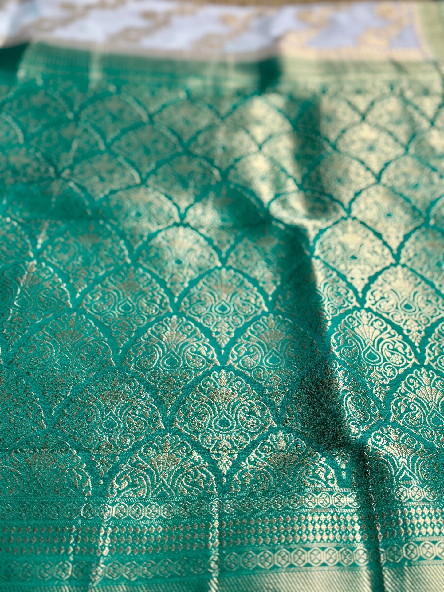 White & Green Jaal pattern Khadi Banarasi Silk saree