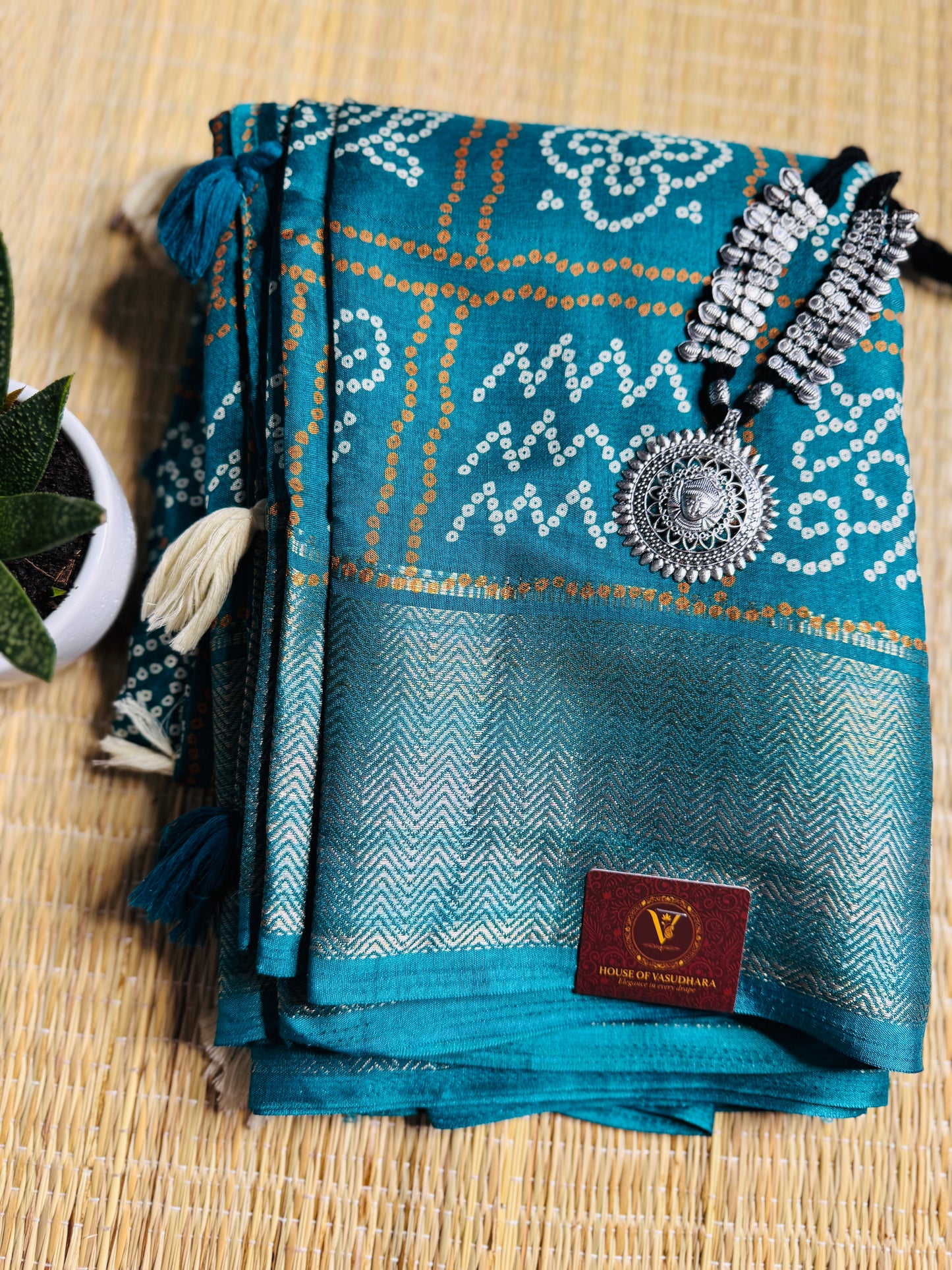 Sea green Dola Bandhani Silk Saree with Zari Border