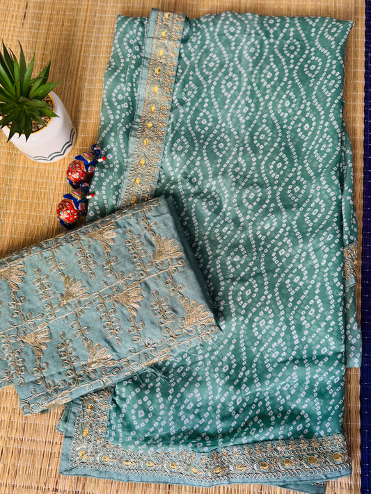 Green georgette saree in bandhini with embellished border