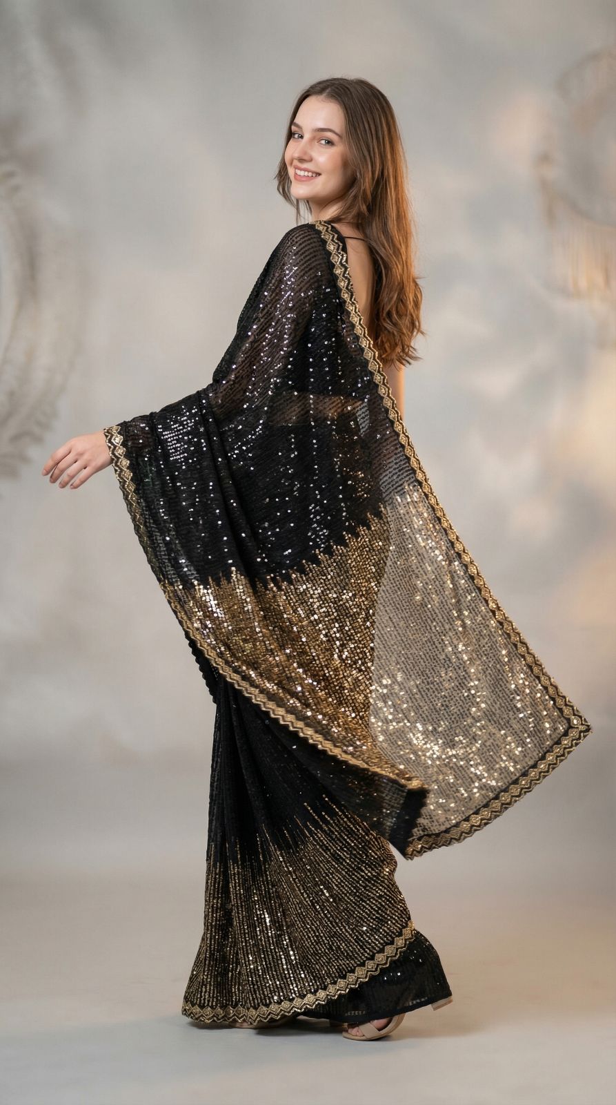 Black georgette saree with sequence and lace border