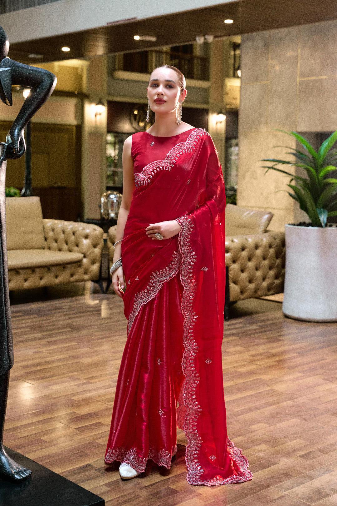 Red tissue silk saree with Scallop border