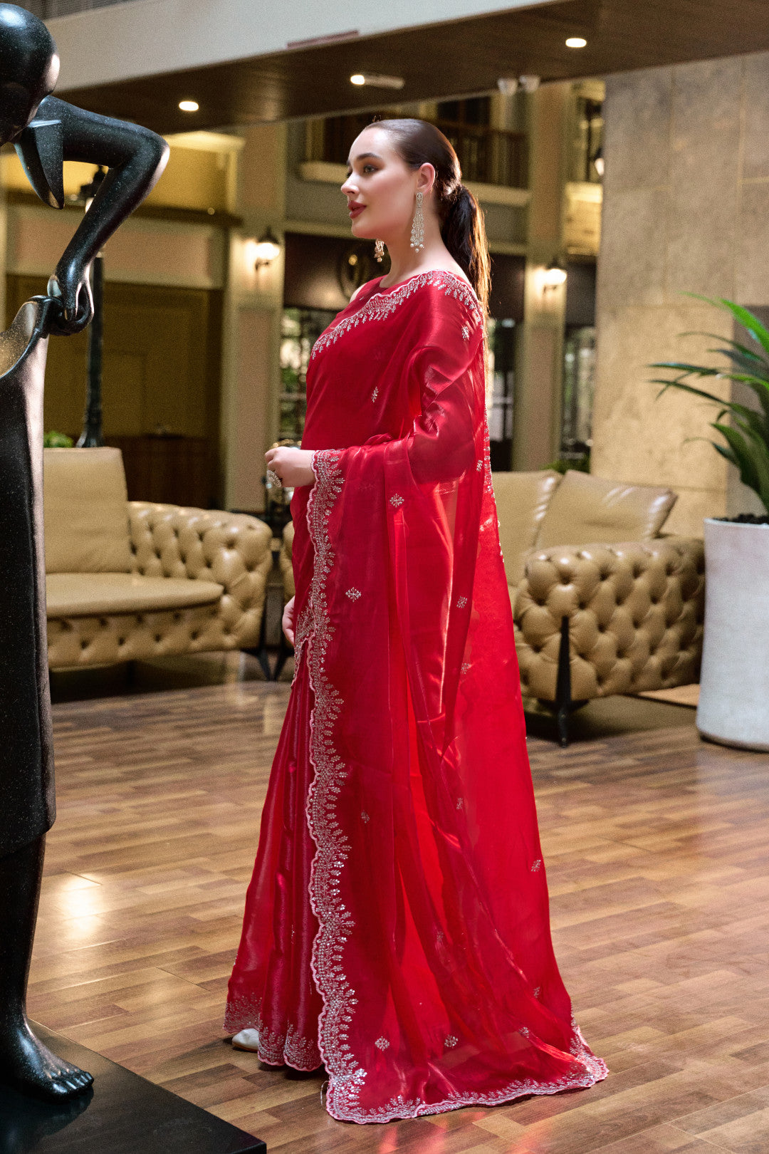 Red tissue silk saree with Scallop border